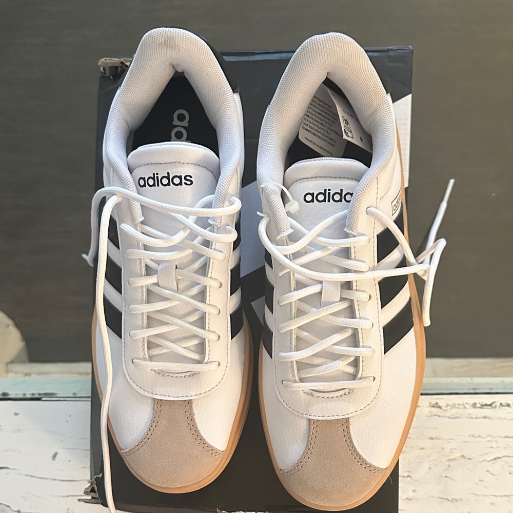 Adidas women’s White and Black Sneakers with Tan Accents